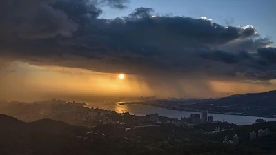 Sunset And Rain Over The City HD Wallpaper