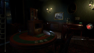 Dark green gothic style room with dark wood furniture and a puzzle box on the table with tarot cards in front