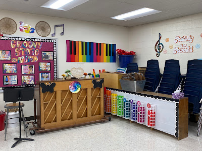 Retro groovy music room decorations. Music classroom decor w a retro theme featuring mushrooms, VW vans, smiley faces and more iconic 60s & 70s decor