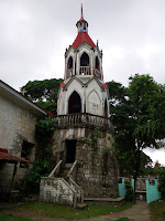 repaired bell tower of Sto Nino De Malitbog or Holy Child of Malitbog Parish Church