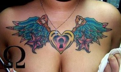 sexy girl with wings tattoo on breast picture