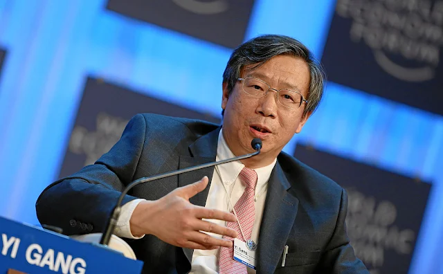 Cover Image Attribute: The file photo of Yi Gang at World Economic Forum, Davos