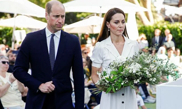 Kate Middleton wore a flippy wiggle dress by Suzannah. Maria Black Jewelry Cha Cha earrings. Alessandra Rich pumps