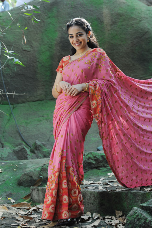 Nitya Menon Latest Cute Stills Nitya Menon New Spicy Images In Saree unseen pics