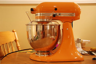 Orange KitchenAid stand mixer