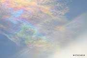 Nacreous clouds/ Rainbow clouds.