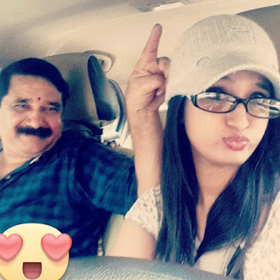 Kavya Shastry with her father 