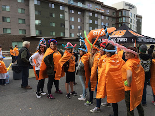 A Group of Women Posing with their balloon hats