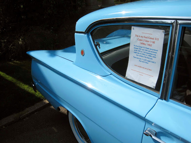 classic cars, classic british cars, classic american cars. 1950s cars blue yellow, ford cortina, yellow triumph, leopard print interior, blue mustang, classic car show uk