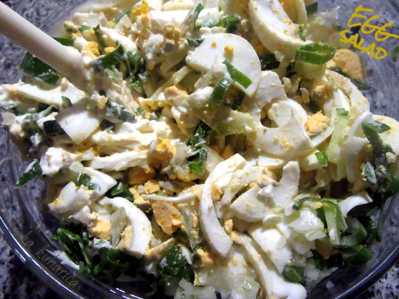 This egg salad is fragrant with fresh basil, green onions, and crunchy cucumbers.