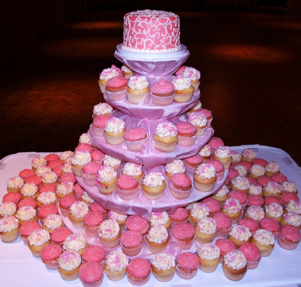 The following amazing pink cupcake towers for wedding comes from The Suffolk