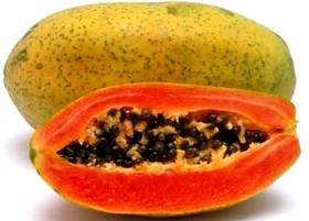 Foto de una papaya entera y partida - Fruta