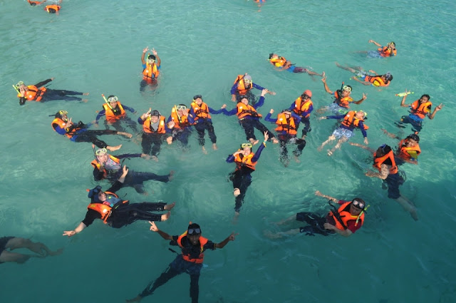 Snorkeling at Pulau Perhentian, using life vest jacket