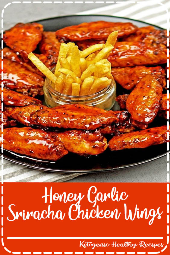 Recipe including course(s): Appetizer; and ingredients: baking powder, black pepper, chicken wings, garlic powder, honey, hot sauce, kosher salt, paprika, rice vinegar, sesame oil