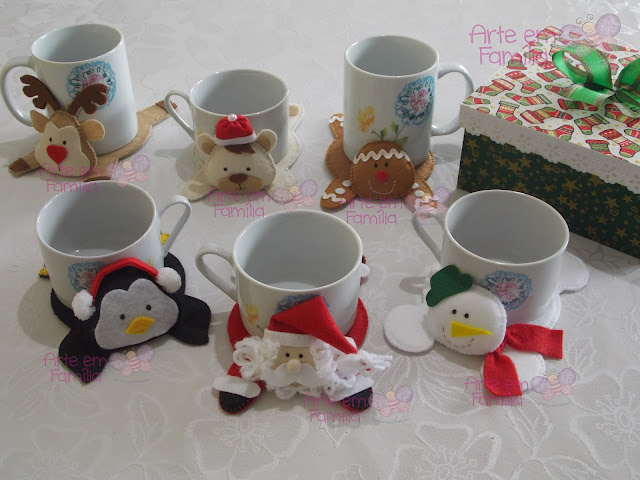 tapetinhos de caneca para o natal, tem papai noel, rena, pinguim, ursinho, boneco de neve e biscoito ginger.