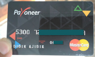 Kartu debit payoneer untuk tarik tunai saldo balance payoneer di atm bank local