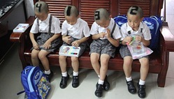Getty_090712_ChinaShavedQuadruplets