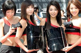 Sexy Girls holding playstation 3