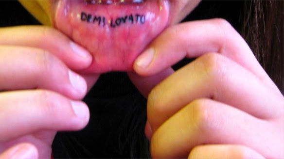  any other way of self-expression rather than making these lips tattoos.