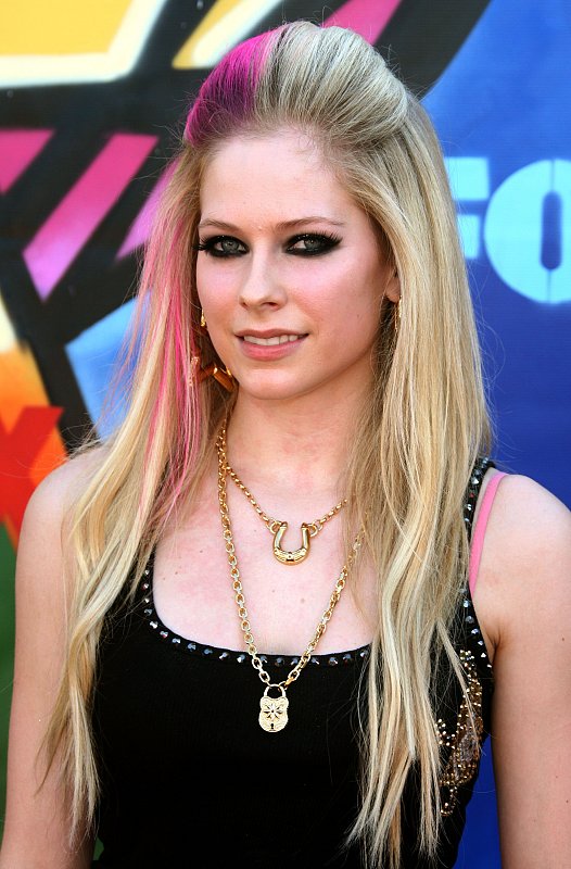 Avril Lavigne Avril Lavigne, 24, steps out with a beehive hairdo, black