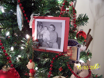 Christmas tree with a photo of a grandpa and his young granddauther