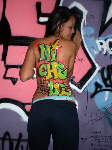 Graffiti Alphabet Tattoo On The Back Beautiful Women