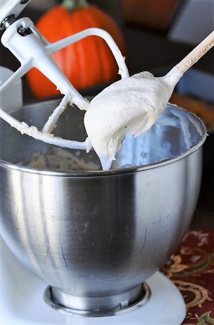 Making Frosting for Caramel Pumpkin Poke Cake Image