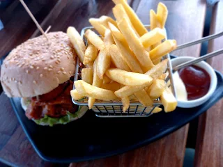 " The Pollo Magnifico chicken burger from The Coffee Box in Paramaribo Suriname"