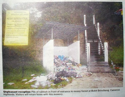 Unpleasant reception: Pile of rubbish in front of entrance to mossy forest at Bukit Brinchang, Cameron Highlands. Visitors will return home with this memory.