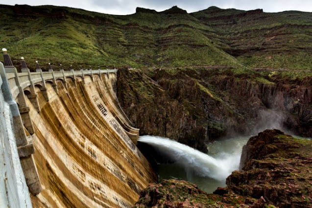 The Owyhee Dam generates electricity and also helps provide farmers with irrigation water. Built in 1932, it created Owyhee Reservoir.