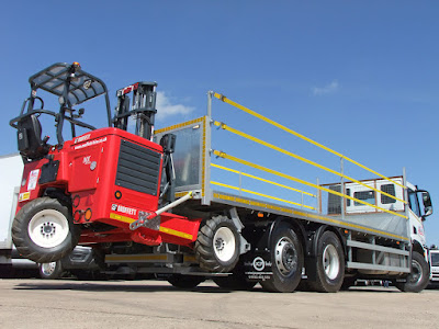 Moffett truck mounted fork lift mounted on rear of 26 tonne flatbed lorry