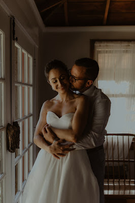 bride and groom caress