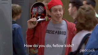 The famous gif from 30 Rock, where Steve Buscemi is a private detective, and he poses as an high school student to be undercover. He's wearing a baseball cap on backwards, carrying a skateboard over his shoulder, and is dressed in a t shirt and hoody. His face is clearly a middle-aged man. His line is, 'How do you do, fellow kids?'