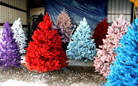 colorfull artificial christmas trees photo