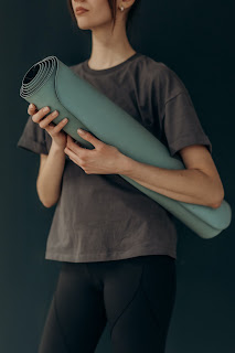 Girl Carrying Fitness Mat
