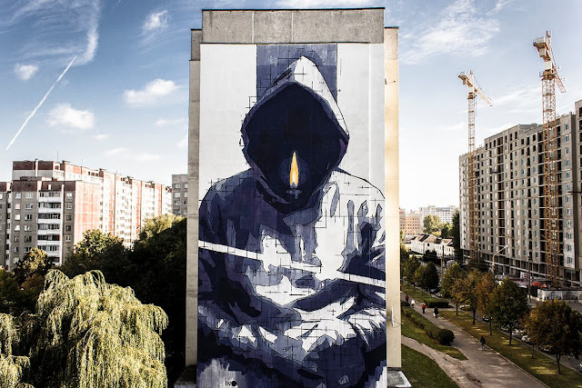 Ino was recently invited by the Ministry of Culture of Belarus to create a mural for a project called "Urban Myths" in Minsk. During only 3 days Greek artist worked on this large new mural titled "Man With No Name".