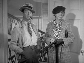 Screen cap of Ned Sparks and Helen Broderick looking like a disgruntled married couple.