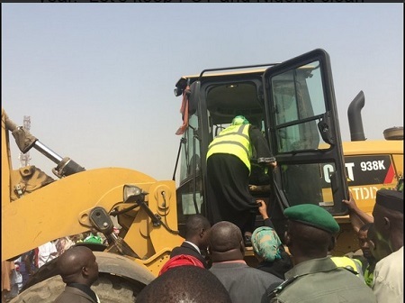 Minister of Environment, Amina Mohammed Drives Bulldozer During Sanitation in Abuja (Photos)