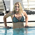 Ashley James in Bikini at a pool in Greece