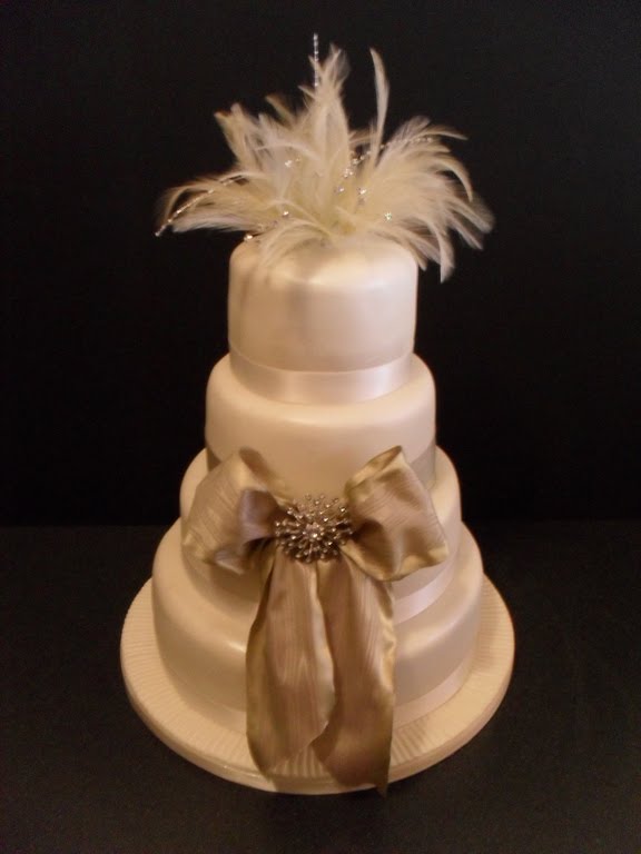 FEATHER AND BLING WEDDING CAKE 4 tier sponge wedding cake 10 8 6 4 