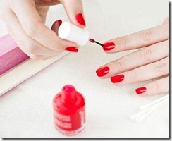 woman applying nail polish-2