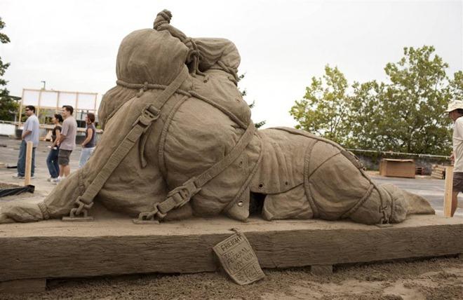 Sand Sculpture Art Work - Sculptures working on his creation...