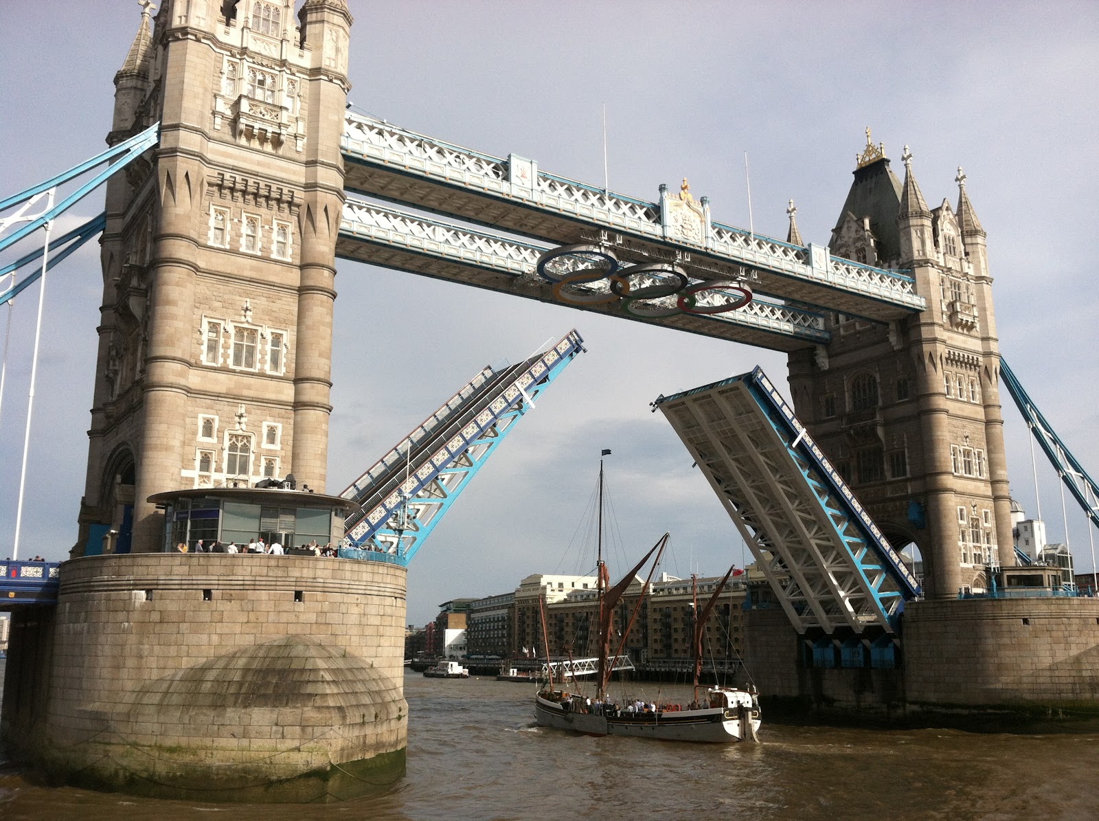 View of Tower Bridge rising to let a sailboat through (this happened 
