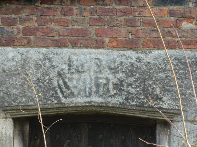 Todd Hall datestone showing the date 1630 and possibly the initials WHIC