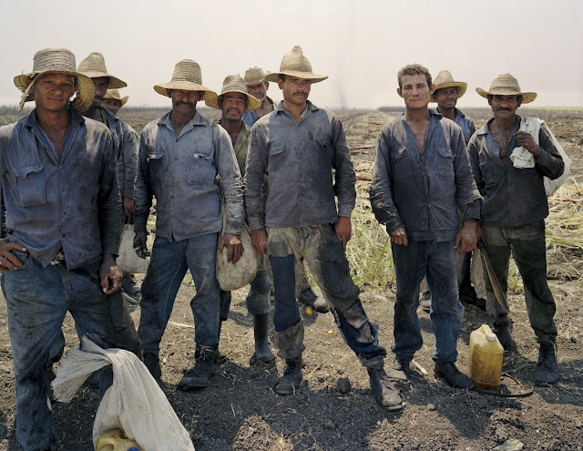 image: Sugar Cane Workers in CUBA By Guggenheim Fellow and Bureau Contributing Photographer Andrew Moore       Visit Andrew Moore www.andrewlmoore.com  or listen to the live, in Gallery Audio Interview at The Bureau Magazine       Archive page, Tap, Choose and Listen  at http://www.bureauofartsandculture.com/BUREAU-AUDIO-ARCHIVES.html 