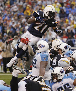 LT leaping over the pile to score a touchdown in the 4th quarter