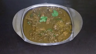 Transfer our Warli Style Mutton Curry to the serving dish