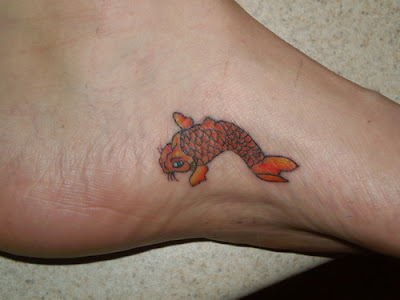Not Big But Cute and Innovative Koi Fish Tattoo For Your Foot