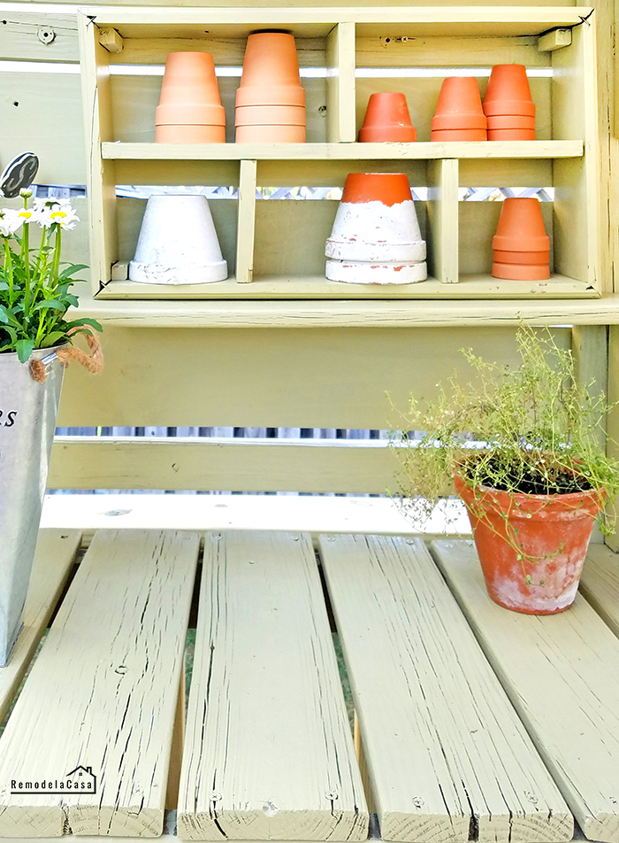 green painted potting bench