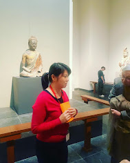 A Metropolitan Museum of Art docent talks about a sculpture of Buddha in gallery 208 and 211.